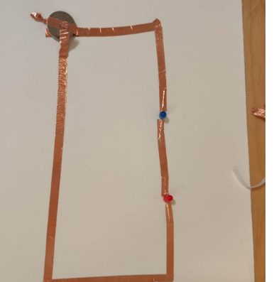 This is more tests I conducted for researching series and parallel circuits. I was testing under what circumstances the bulb would light up and whether it had anything to do with the placement of the copper foil. At what position would the copper foil touch the electrode with the bulb to light up the bulb?