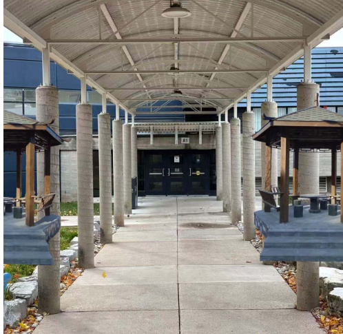 This is my idea for adding some elements to the selected space in Workshop 2. This is my idea for adding some elements to the selected space in Workshop 2. The first one is that I hope to add tables to the corridor, changing the original two-way passage into a one-way one. My aim is to add tables in the corridor to provide a place for people to rest outdoors.The second picture shows that I replaced the table element in the space with a pavilion. I added a pavilion to the space. The pavilion is located on the grass beside the main path, and it has the same effect